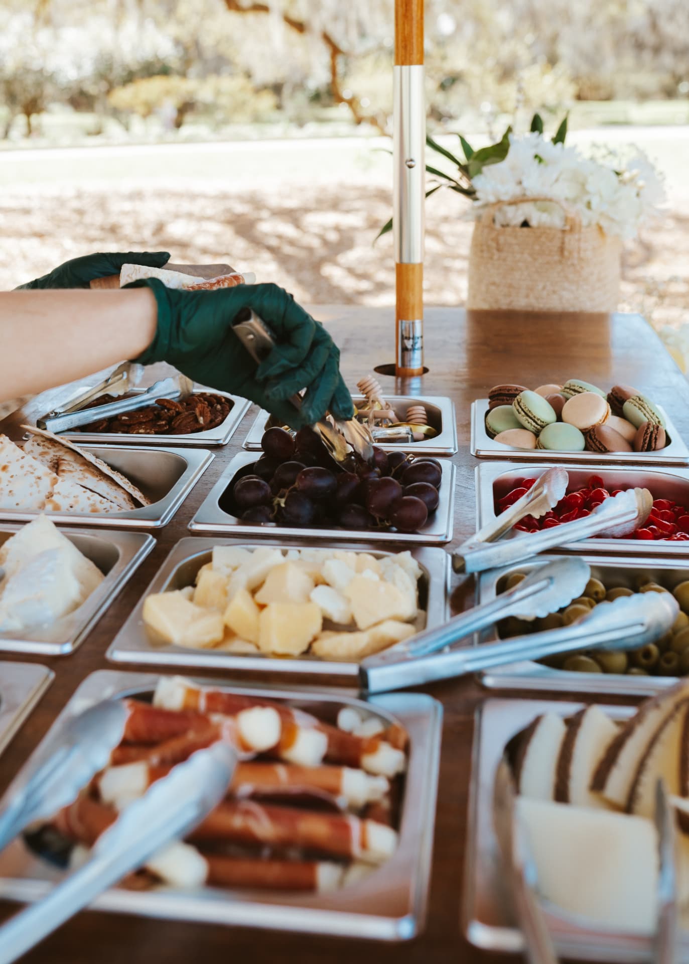Fresh cheeses, fruit, meats and sweets arranged in the charcuterie cart
